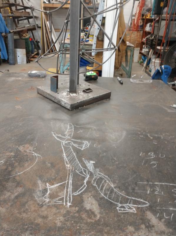 Study- soapstone on steelwork table, 2021 
Erased.